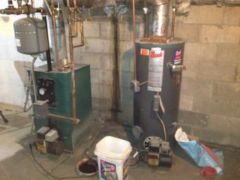 Before pictures of an old oil heating system in need of upgrading Shirley, NY